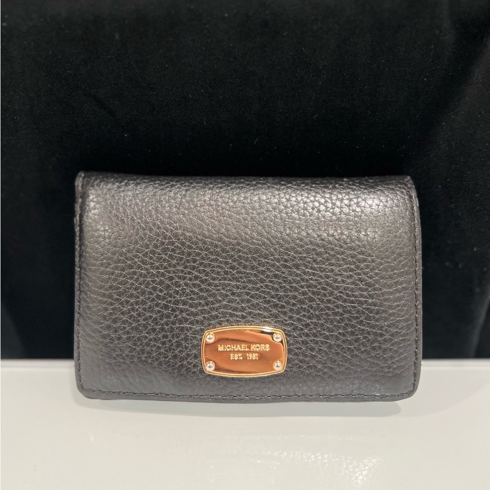 Michael Kors Black leather wallet w/ Gold